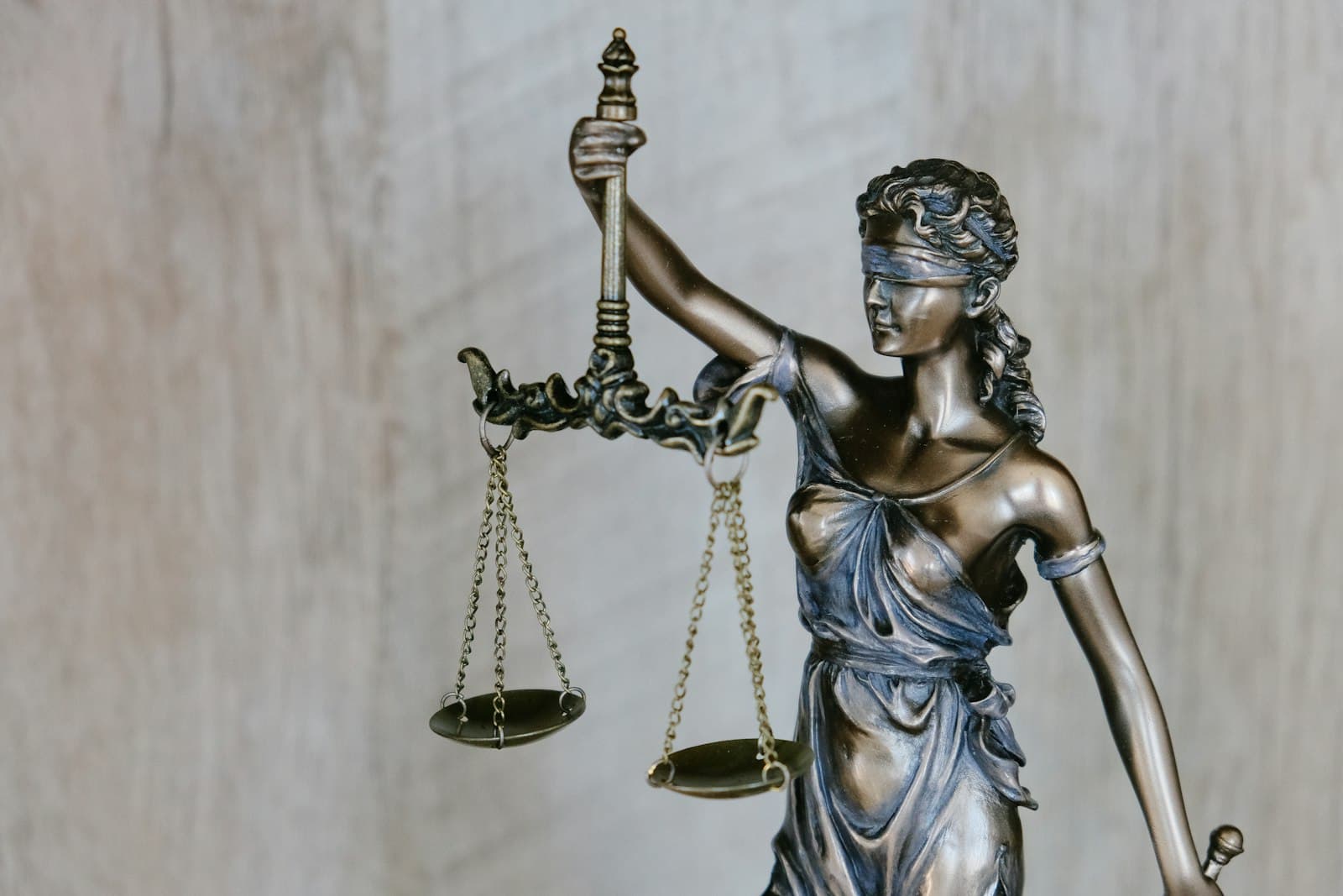 Stack of law and regulation books on a desk