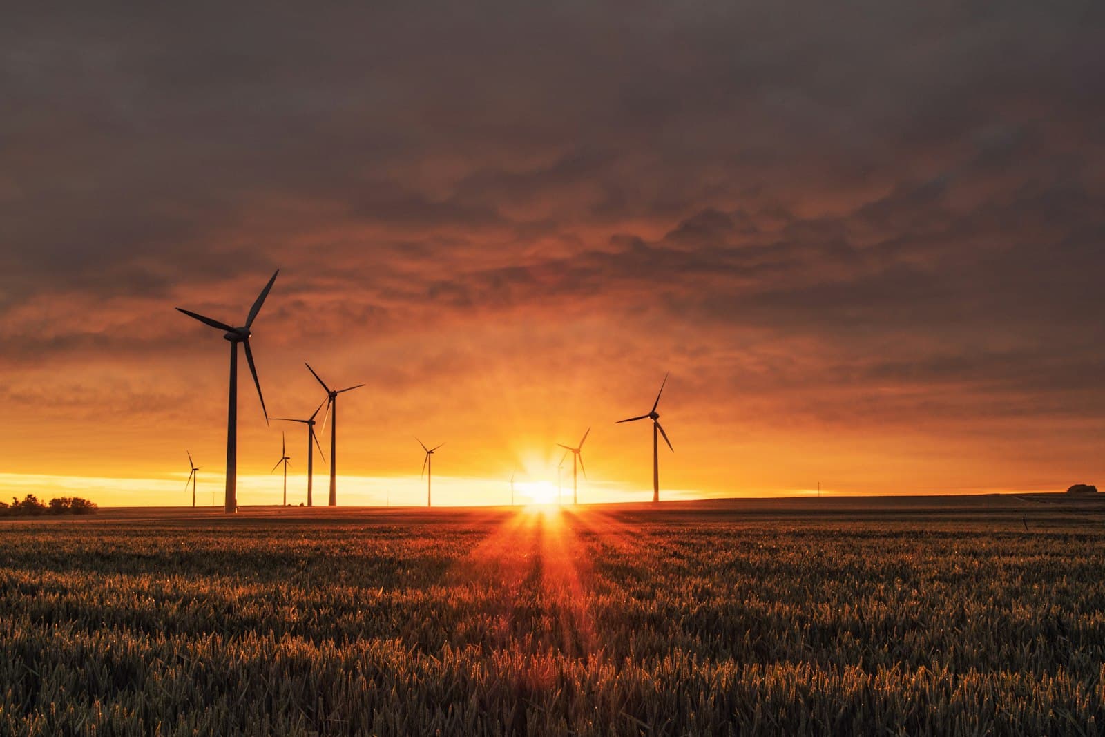 Wind turbines generating power in open countryside